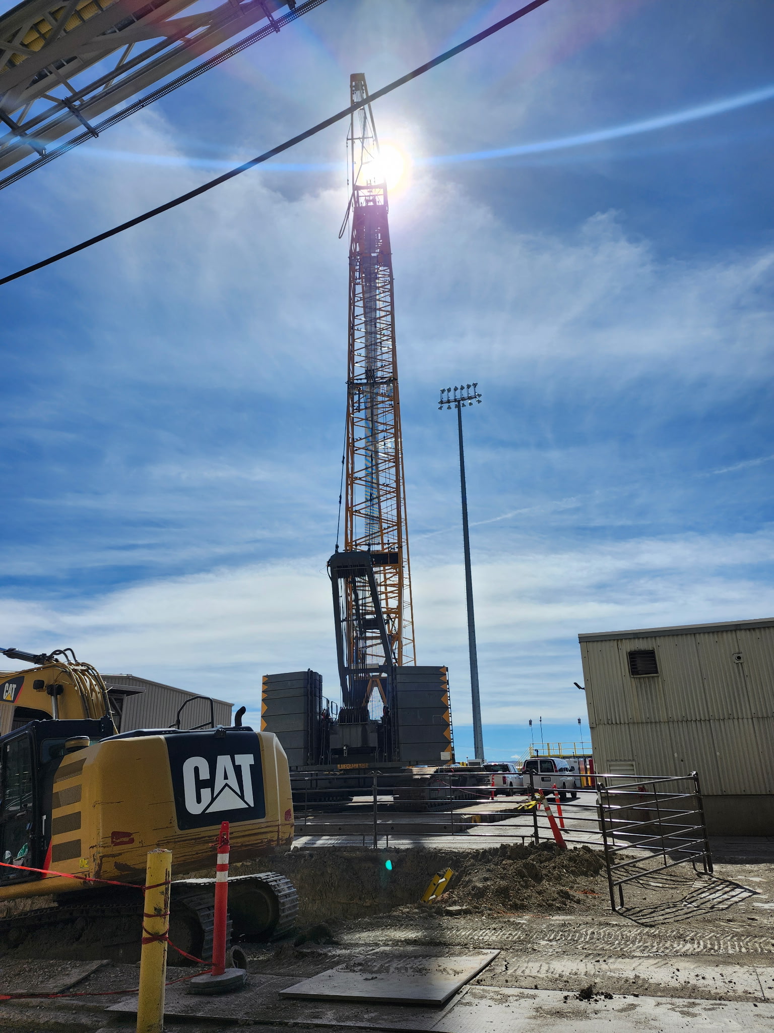 Industrial crane and equipment work under open sky