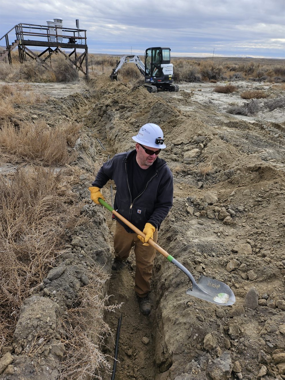 Technician working at an industrial excavation site